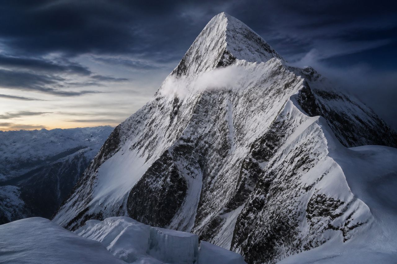 Snow-covered summit at dusk — K2 simulation
